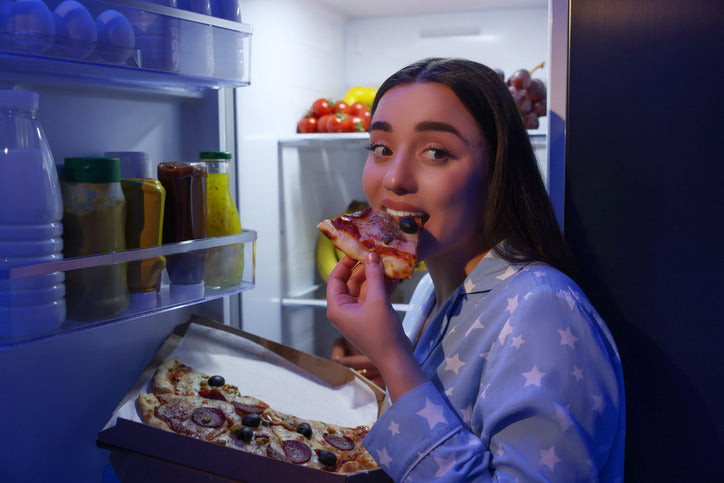iStock-1795479401_eating_pizza.jpg Nupo