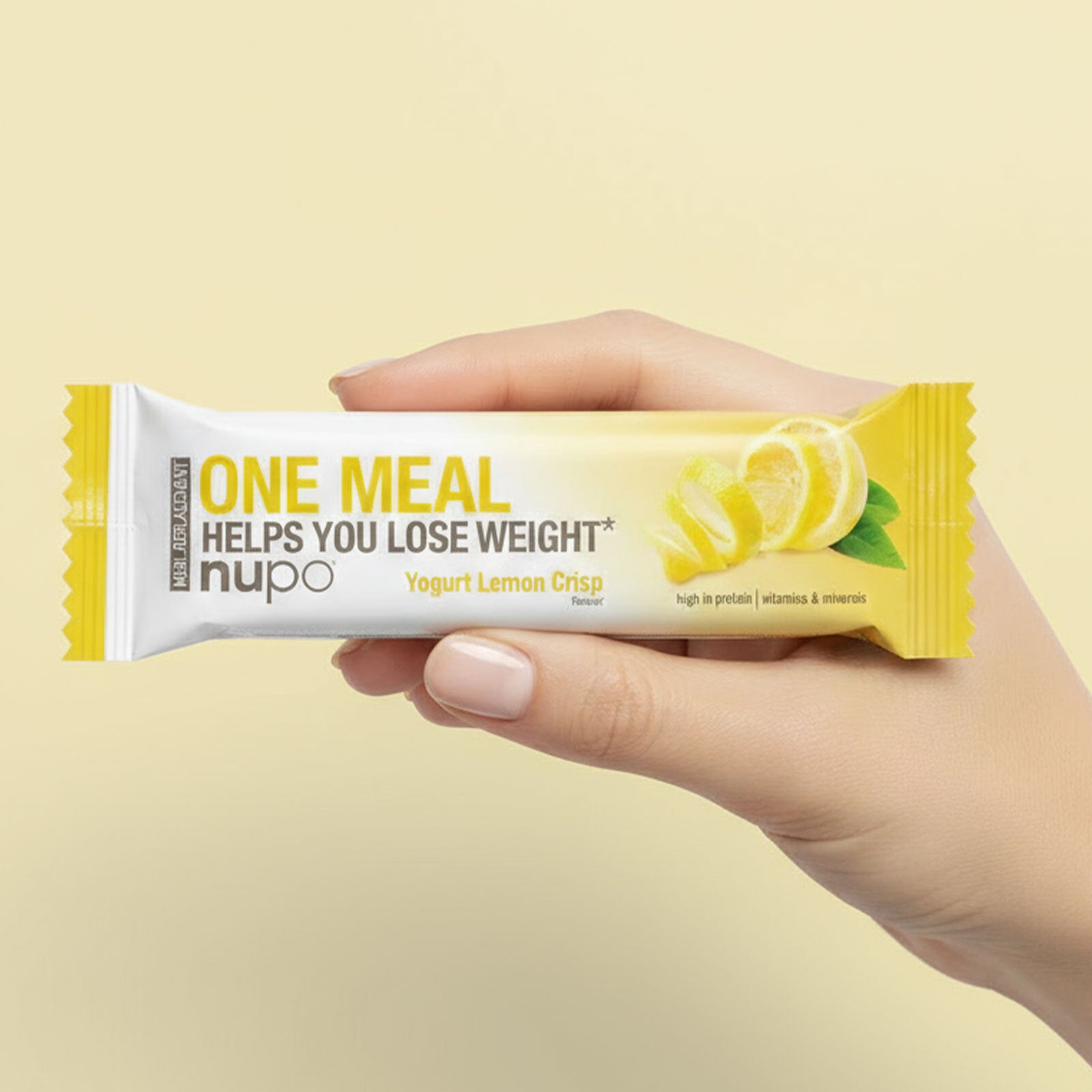 nupo lemon crisp bar held in hand black friday edition